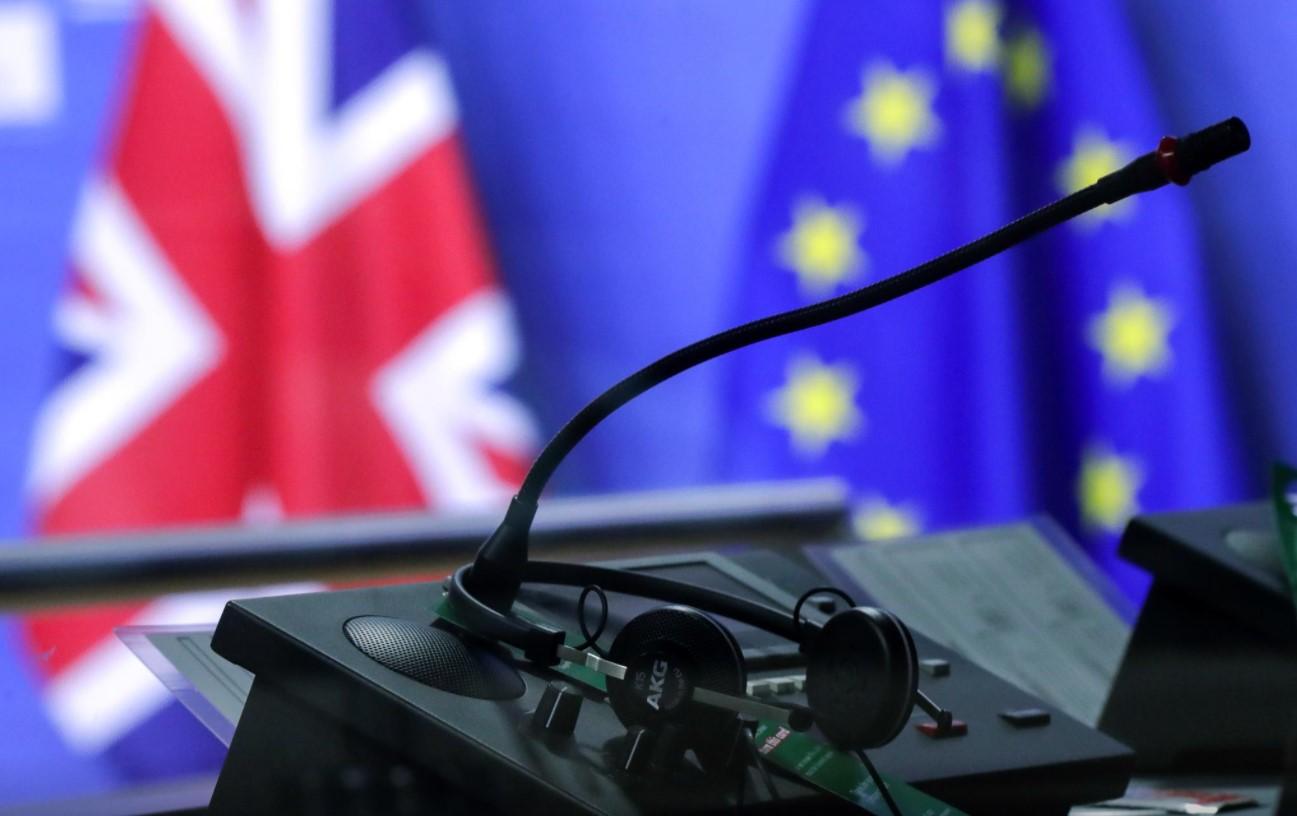 Flags of the Union Jack and European Union are seen through interpreters booth ahead of the meeting of European Commission President Ursula von der Leyen and British Prime Minister Boris Johnson, in Brussels, Belgium December 9, 2020. - Avaz