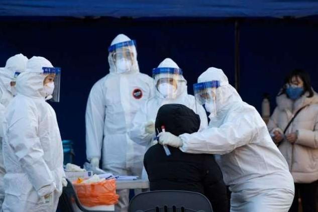 Germany mulls longer shutdown as virus deaths top 1,000