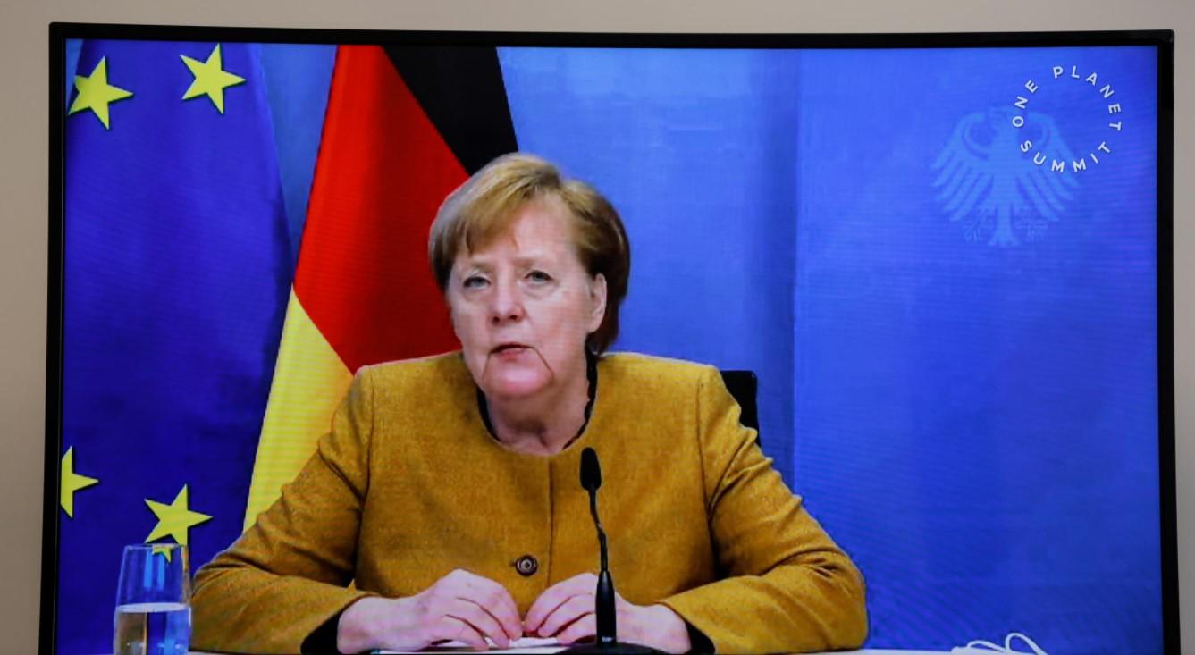 German Chancellor Angela Merkel speaks during a video conference at The Elysee Palace in Paris, France, January 11, 2021. - Avaz