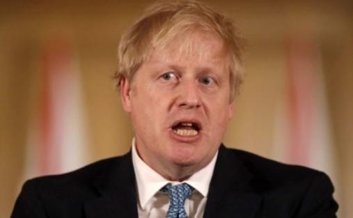 Britain's Prime Minister Boris Johnson holds a news conference addressing the government's response to the novel coronavirus COVID-19 outbreak, inside 10 Downing Street in London on 17th of March 2020. - Avaz