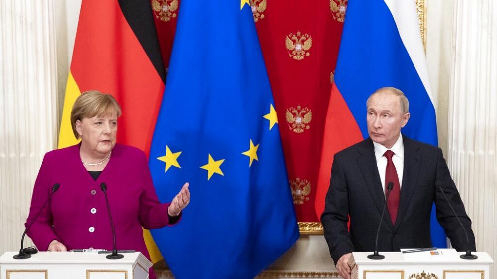 Angela Merkel i Vladimir Putin - Avaz