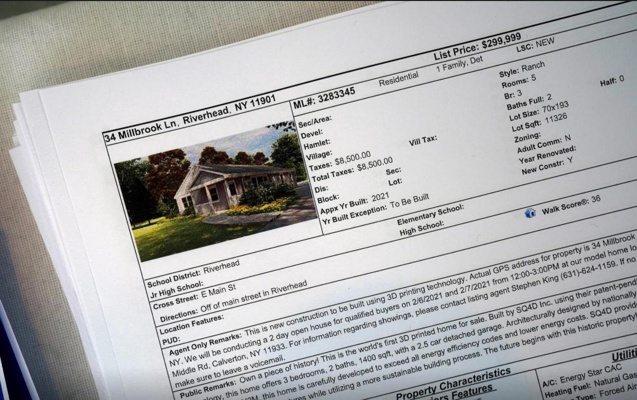 A real estate listing sheet for 3D printed house for sale is pictured in Long Island, New York, U.S., February 11, 2021. - Avaz