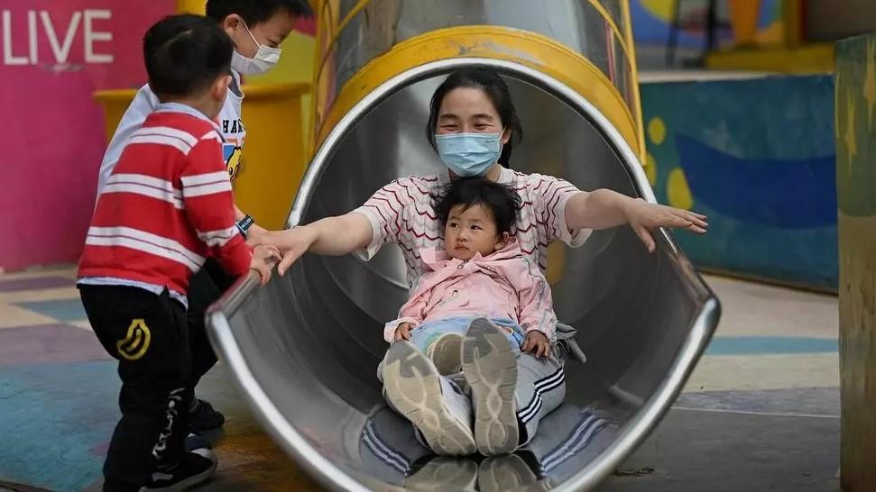 China allows couples to have three children