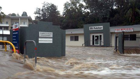 Man dies in flood as wild weather hits Australia