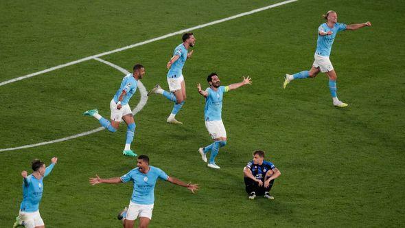 Manchster City players celebrate their 1-0 win at the end of the Champions League final soccer match - Avaz