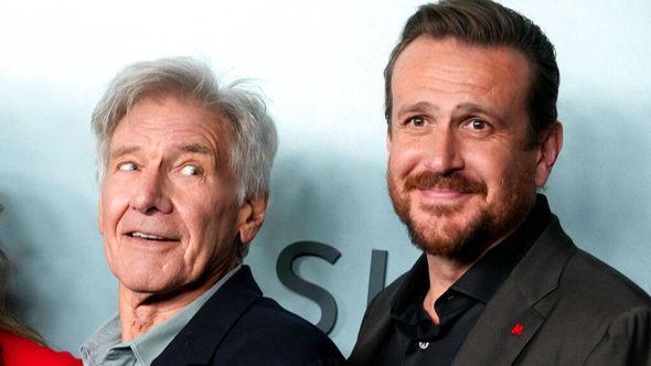 Harrison Ford, left, a cast member in "Shrinking," looks over at fellow cast member Jason Segel at the premiere of the Apple TV+ series - Avaz