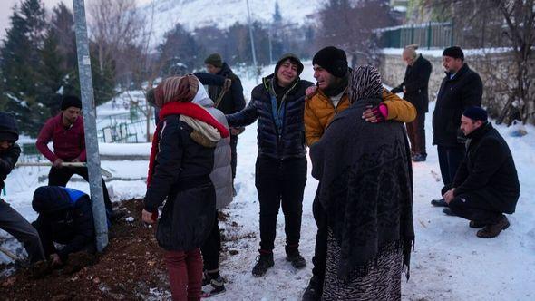 Relatives and friends of Syrian refugee Naziha Al-Ahmad bury her in a cemetery after she died during an earthquake, in Elbistan, southeastern, Turkey, Friday - Avaz